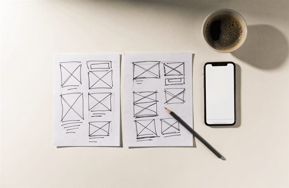 Sketsa wireframe website di atas kertas